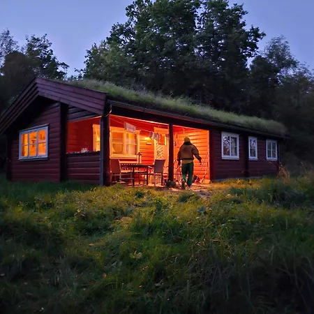 Дом отдыха Charming Norwegian Log Cabin With Grass Roof
